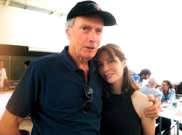 American actor and producer Clint Eastwood with French actress Alix Bénézech